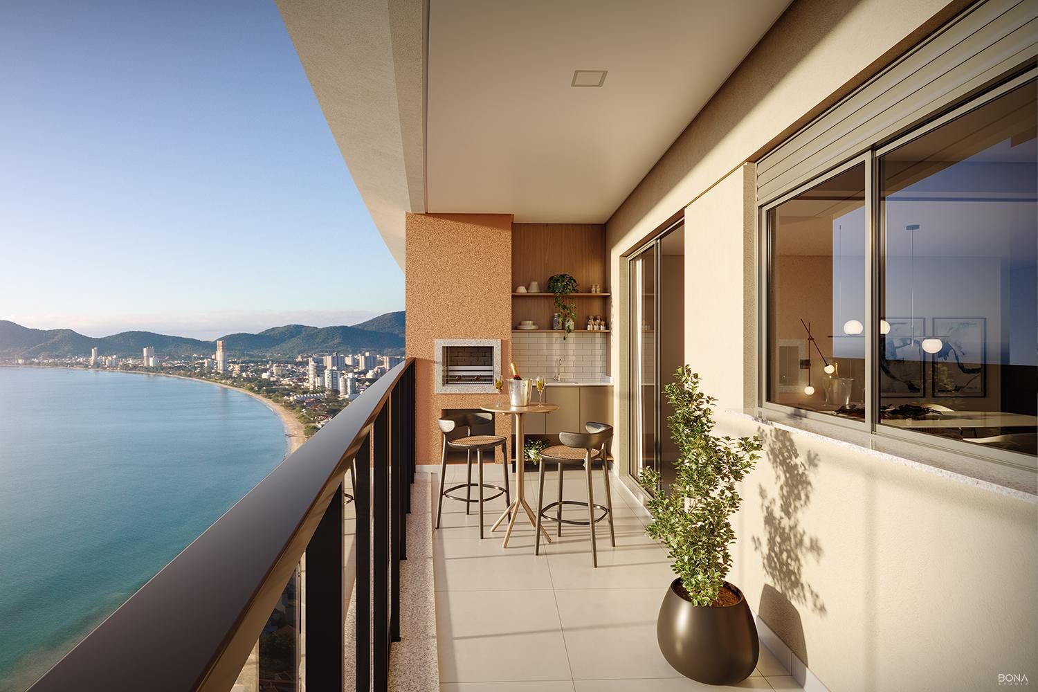 Varanda gourmet com churrasqueira e vista para a orla de Penha